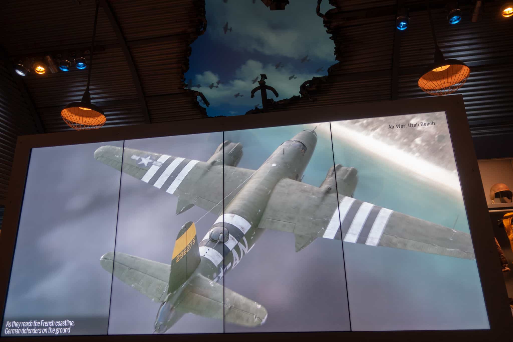 nola ww2 museum A video in the ceiling of the nola ww2 museum