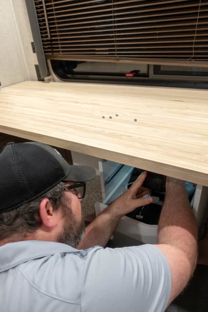 rv-desk Barrett working on dual desk assembly