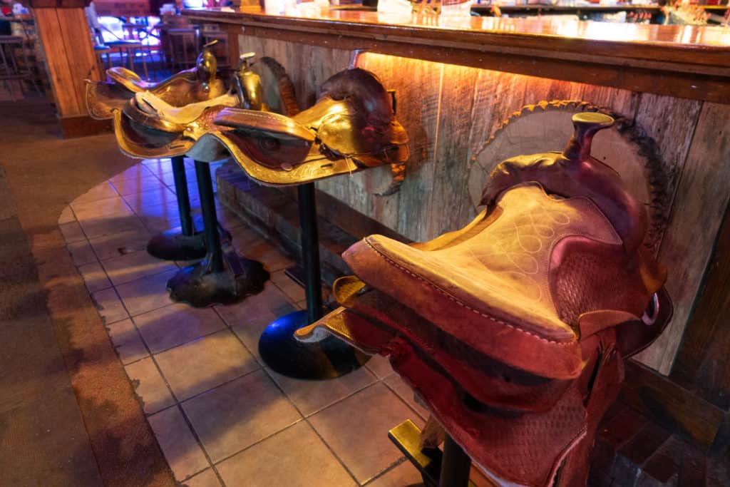 Saddle bar stools at Cotton Eyed Joe