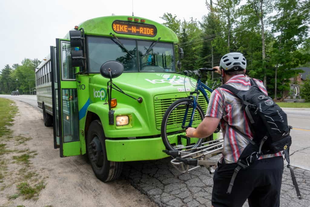 Barrett getting his bike off the Bata bus during our bike-n-ride tour in traverse city