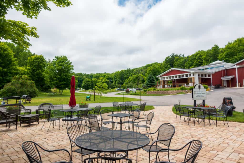 bike-n-ride traverse city Black Star Farms Distillery patio on bike-n-ride tour