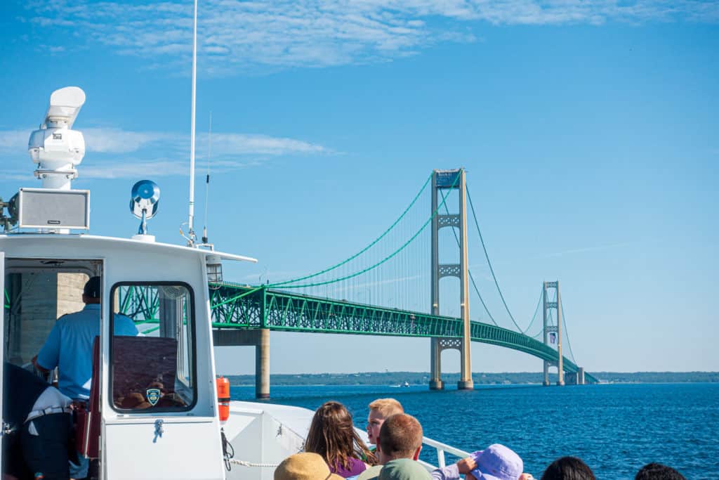 how-to-get-to-mackinac-island Heading to Mackinac Island from the Ferry while going under Mighty Mac