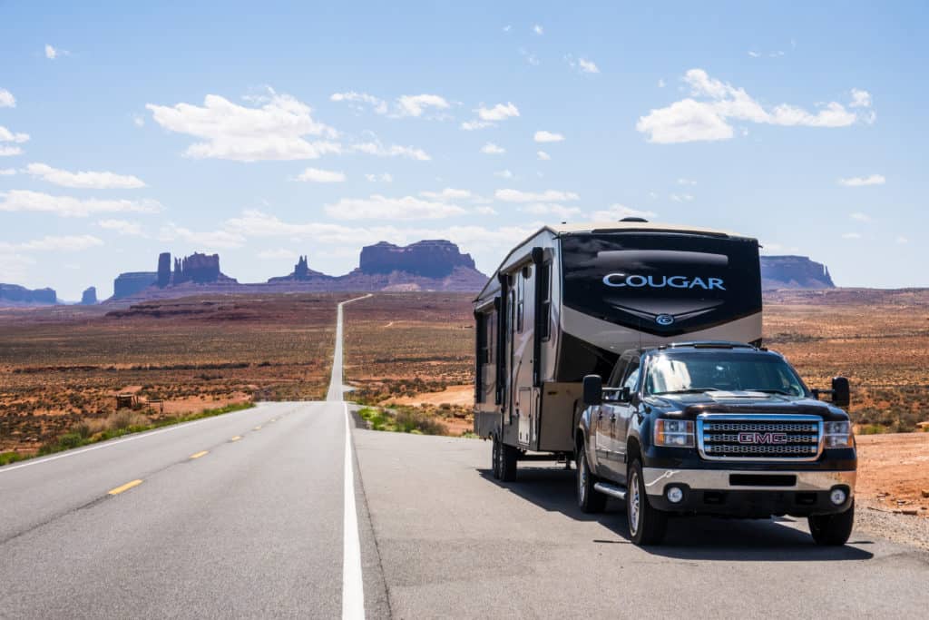 Cindy and Barrett's full-time RV living Cougar rig in Monument Valley