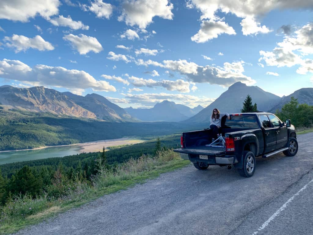 Cindy in the bed of our truck in Glacier National Park