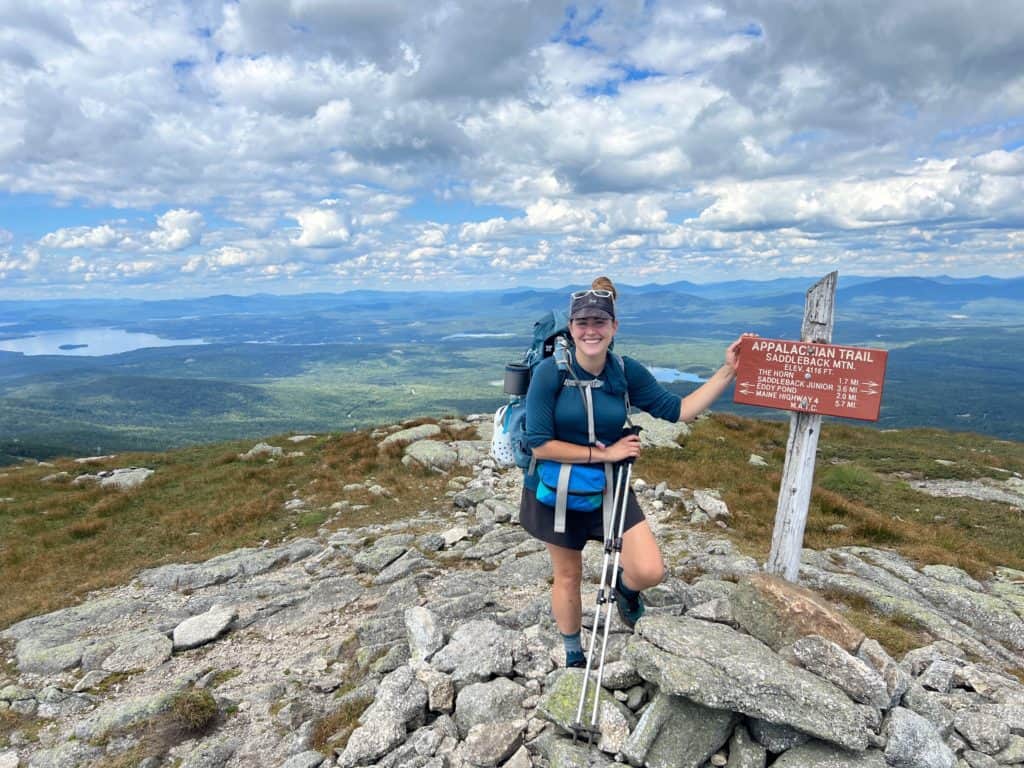 Cindy hiking in the Women's Smartwool Merino Sport 150 Hoodie, part of the Appalachian Trail Gear List