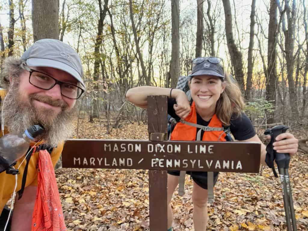 Cindy and Barrett at the Mason Dixon Line on the Appalachian Trail