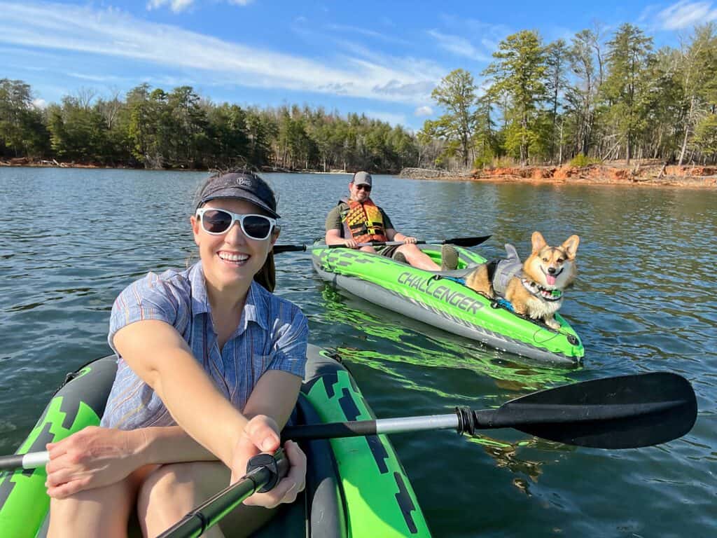 RV must-haves Cindy, Barrett and their dog Marty kayaking in inflatable kayaks