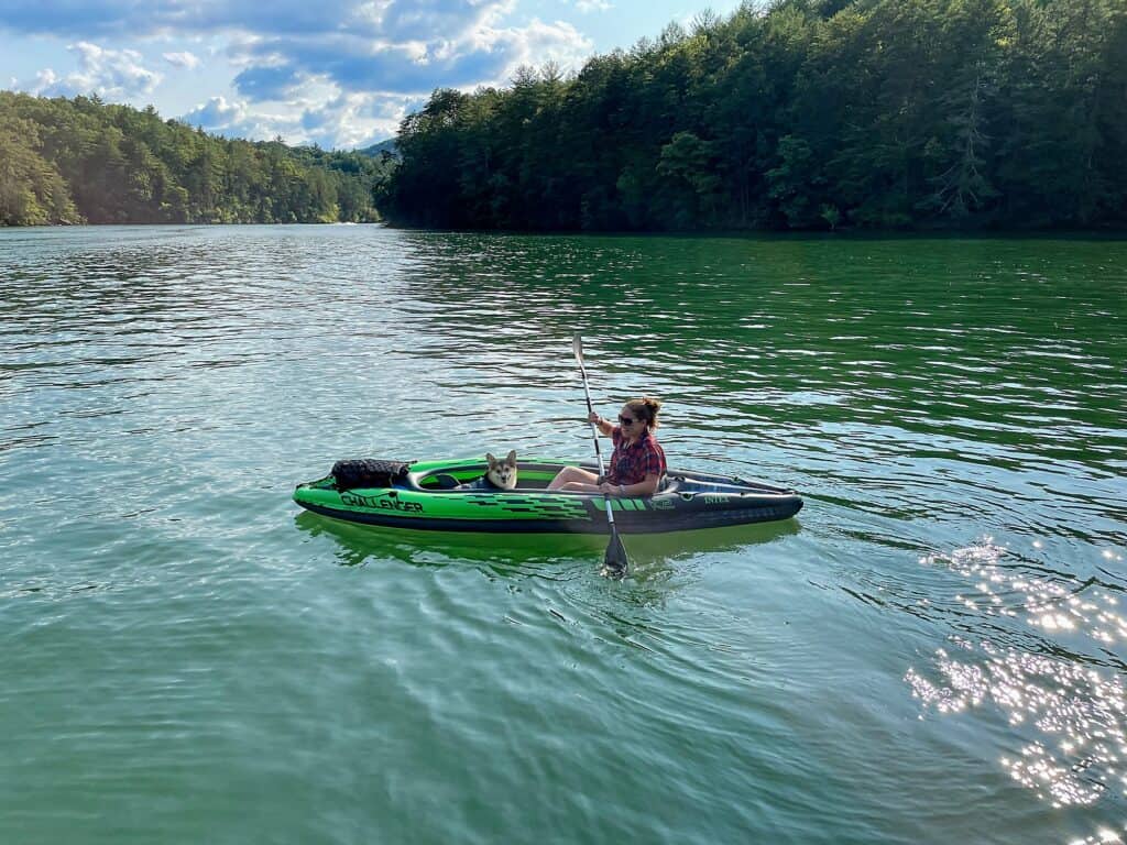 RV must-haves Cindy and her dog Marty kayaking in an inflatable kayak