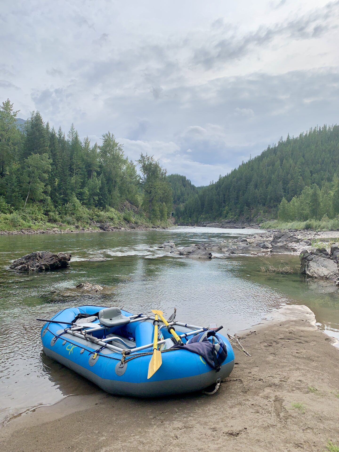 Glacier National Park Itinerary Our raft on the shore of the Middle Fork Flathead River in Montana