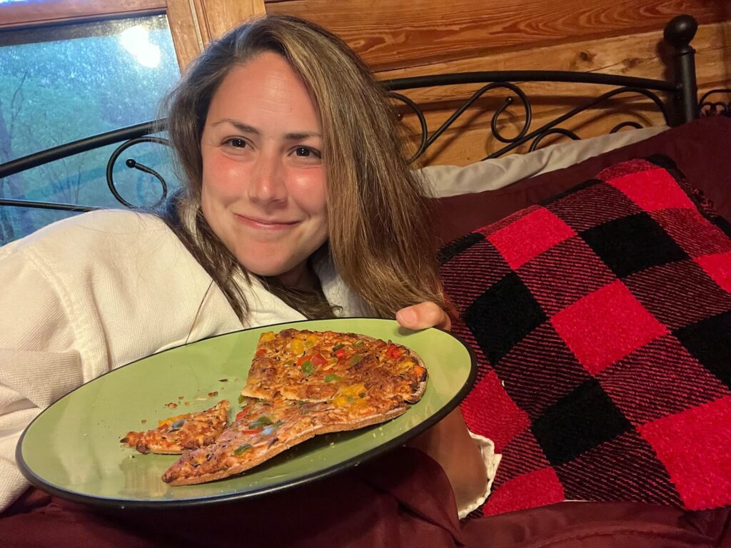 hiking the appalachian trail Cindy sadly eating pizza in bed