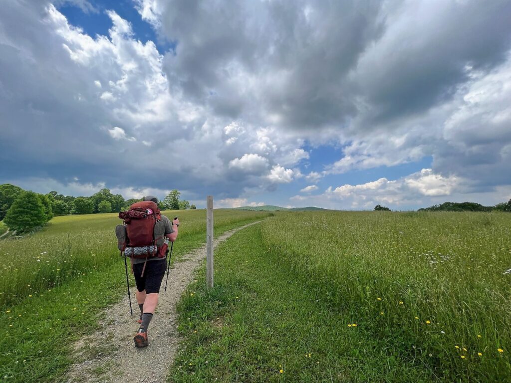 Appalachian Trail Hike A hikers in a pasture on the Appalachian Trail