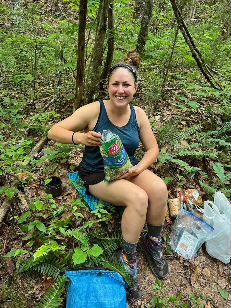 appalachian trail hike Cindy eating a salad kit on the AT