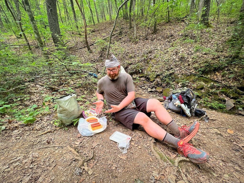 appalachian trail hike Barrett eating hot dog wraps on the AT