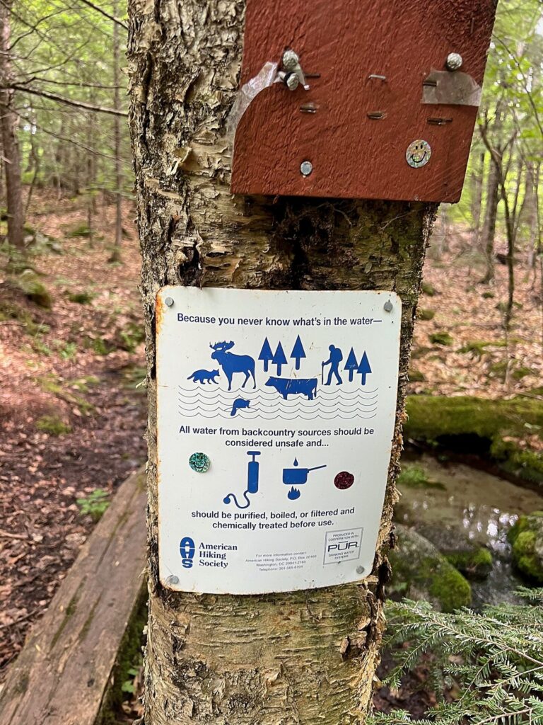 water sign in the 100 mile wilderness in maine