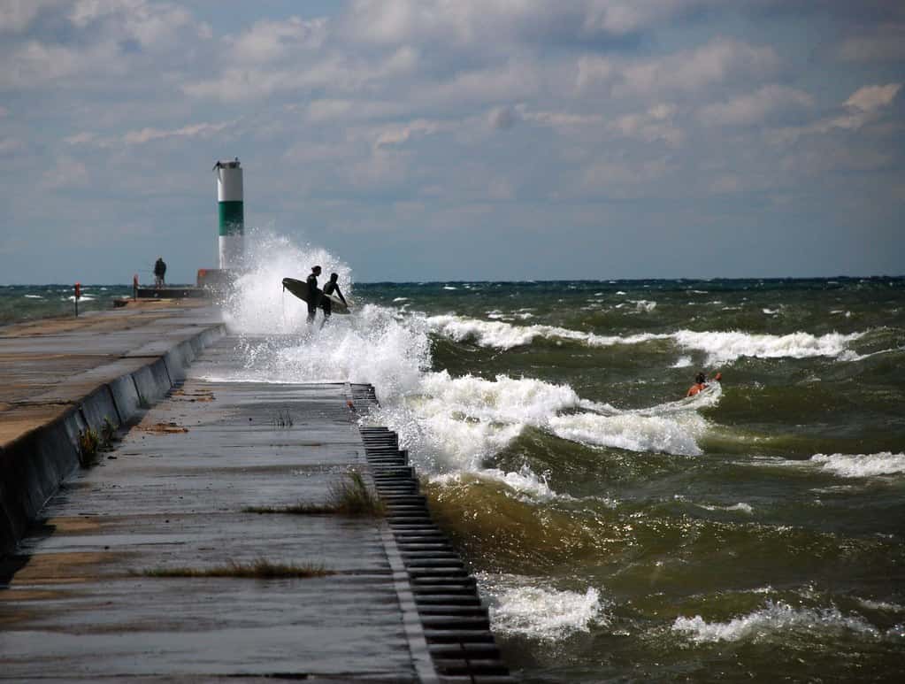 Surfers getting ready to surf the Great Lakes